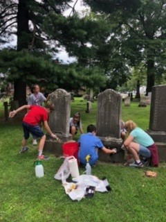 Cleaning at cemetery